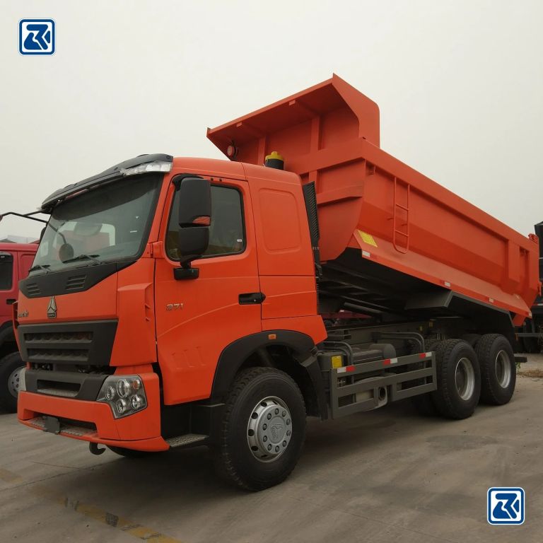 Camion-benne orange NEEDL EMARK PT DJARUM .CN INTERNATIONAL GROUP CHINA CO., LTD, vue latérale